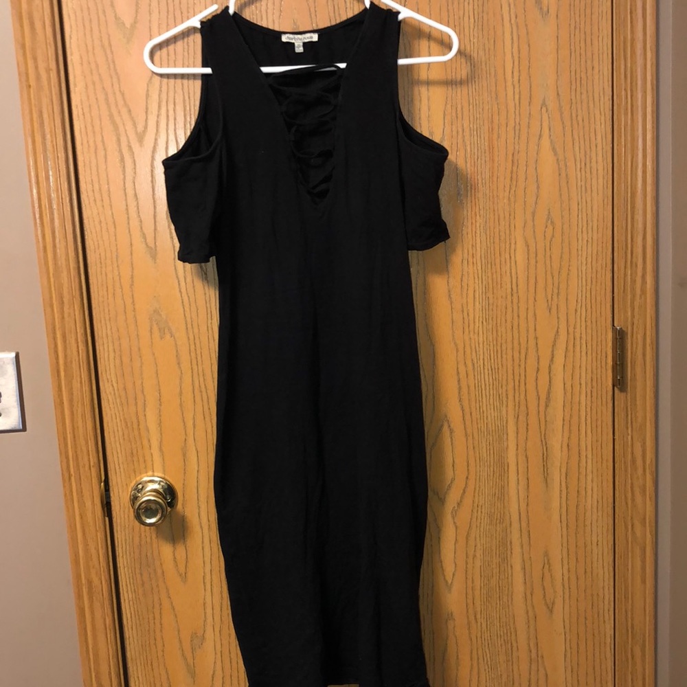 Bodycon black dress with deep neckline